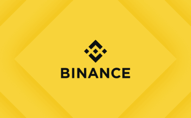 логотип Binance на жёлтом фоне